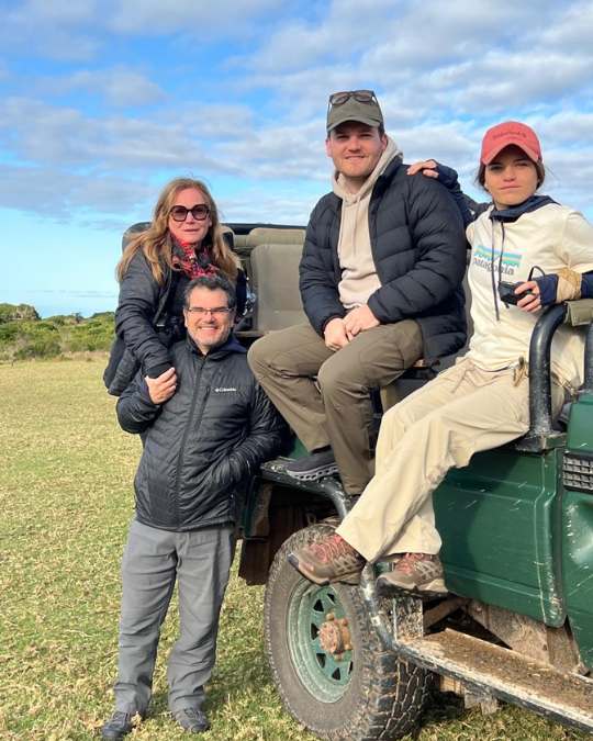 Nanan Travel - Balancing Luxury & Wilderness in African Safaris Ultimate Guide- Elephants at pool at lodge in Africa