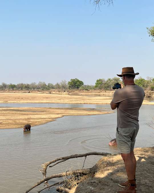 Nanan Travel - Balancing Luxury & Wilderness in African Safaris _ Ultimate Guide-safari break German drinking coffee
