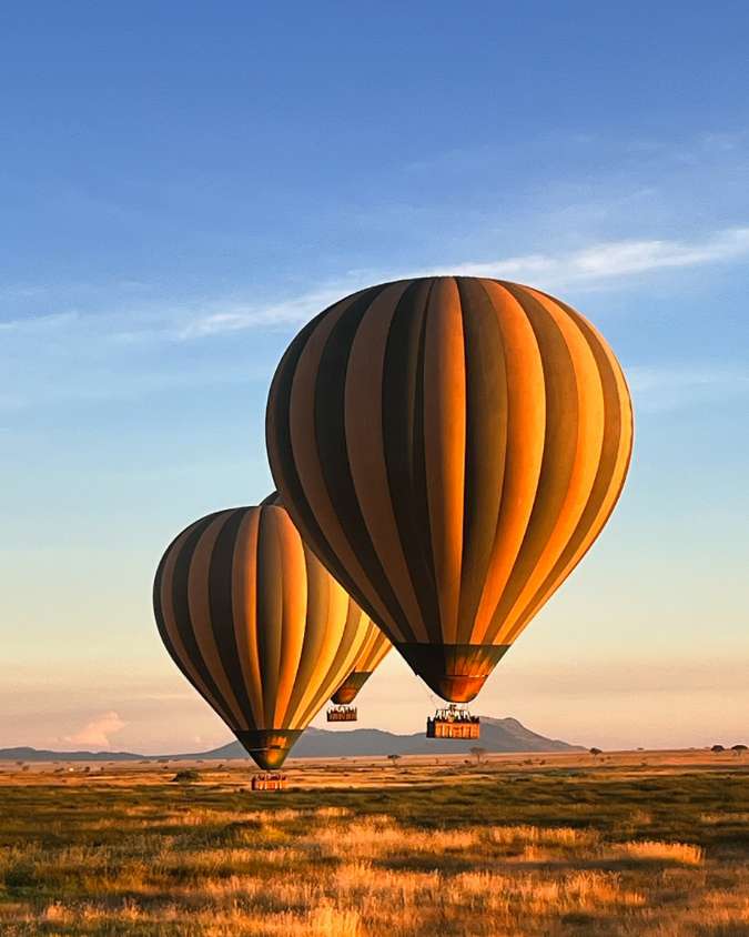 Nanan Travel - Balancing Luxury & Wilderness in African Safaris _ Ultimate Guide-safari break German drinking coffee