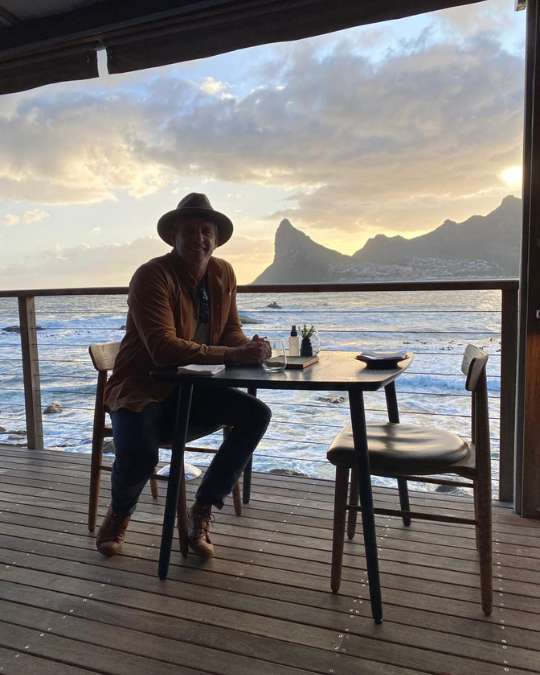 Nanan Travel - Balancing Luxury & Wilderness in African Safaris _ Ultimate Guide-safari break German drinking coffee