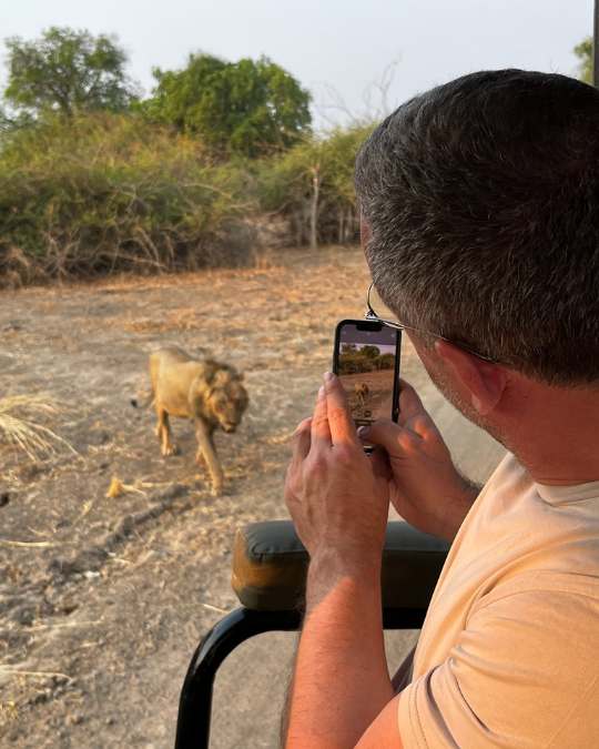 Nanan Travel - Balancing Luxury & Wilderness in African Safaris _ Ultimate Guide-safari break German drinking coffee